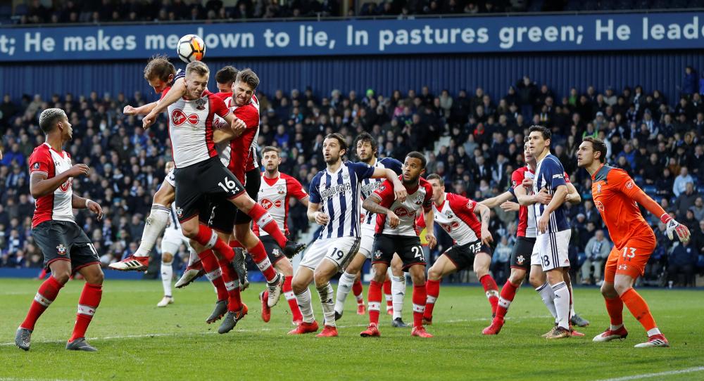 A tense moment from the match between Southampton and West Bromwich Albion during their FA Cup match at West Bromwich Saturday. — Reuters