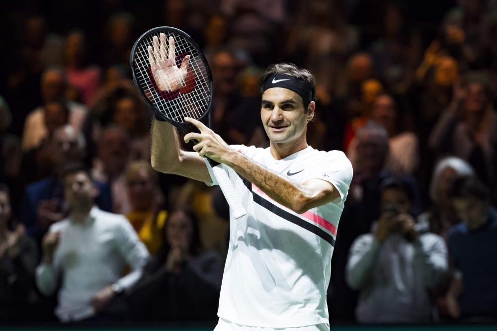 Switzerland’s Roger Federer celebrates after winning against Italy’s Andreas Seppi at the ABN AMRO World Tennis Tournament in Rotterdam Saturday. — AFP