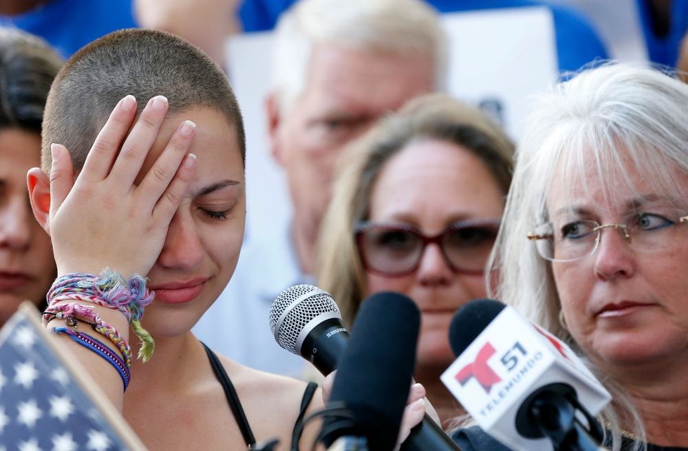 Marjory Stoneman Douglas High School student Emma Gonzalez reacts during her speech at a rally for gun control at the Broward County Federal Courthouse in Fort Lauderdale, Florida, on Saturday. — AFP