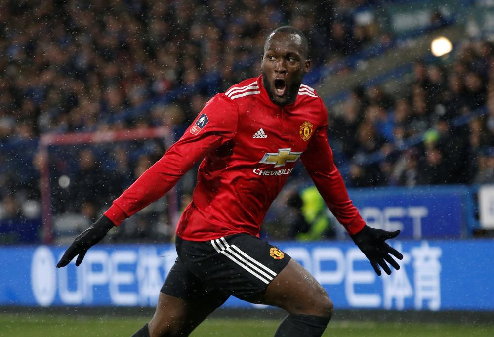 Manchester United’s Romelu Lukaku celebrates scoring against Huddersfield Town during their FA Cup match at John Smith’s Stadium, Huddersfield, Saturday. — Reuters