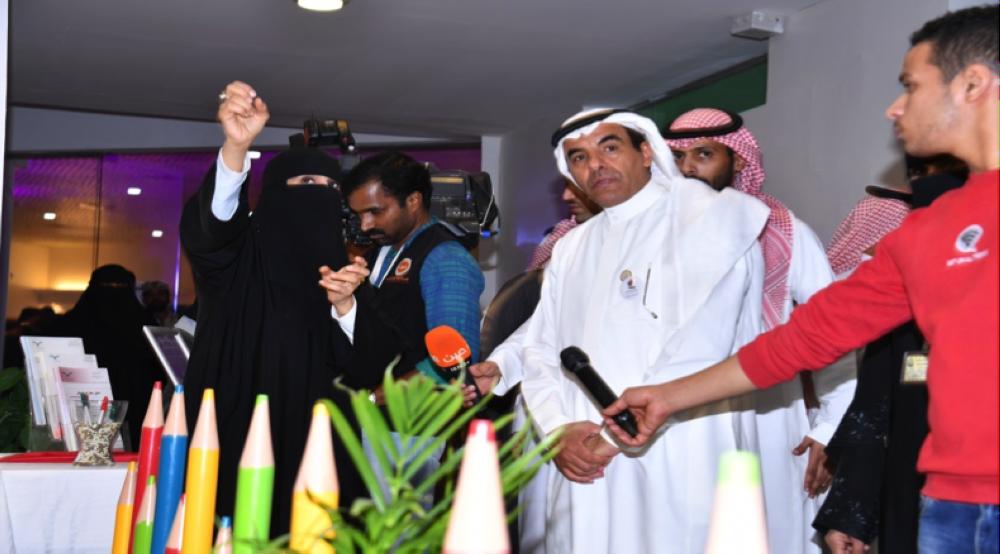 Deputy Minister of  Education Dr. Abdulrahman Al-Assami reviews the activities at women's section of the Education Ministry's pavilion at Janadriya on Saturday.