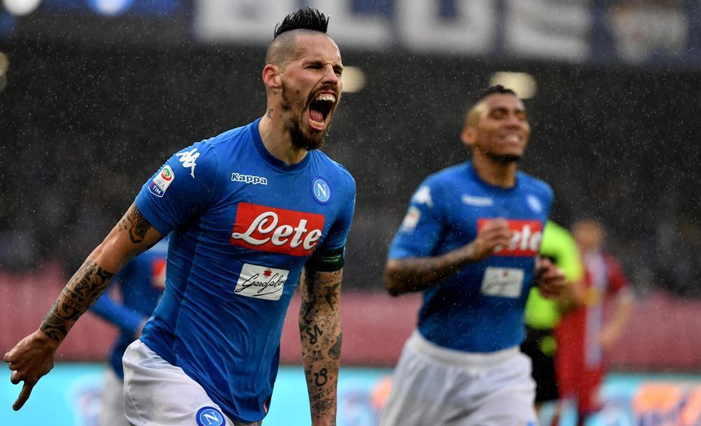 Napoli's midfielder Marek Hamsik celebrates after scoring a goal during the Serie A football match against Spal at San Paolo Stadium Stadium in Naples Sunday. — AFP 
