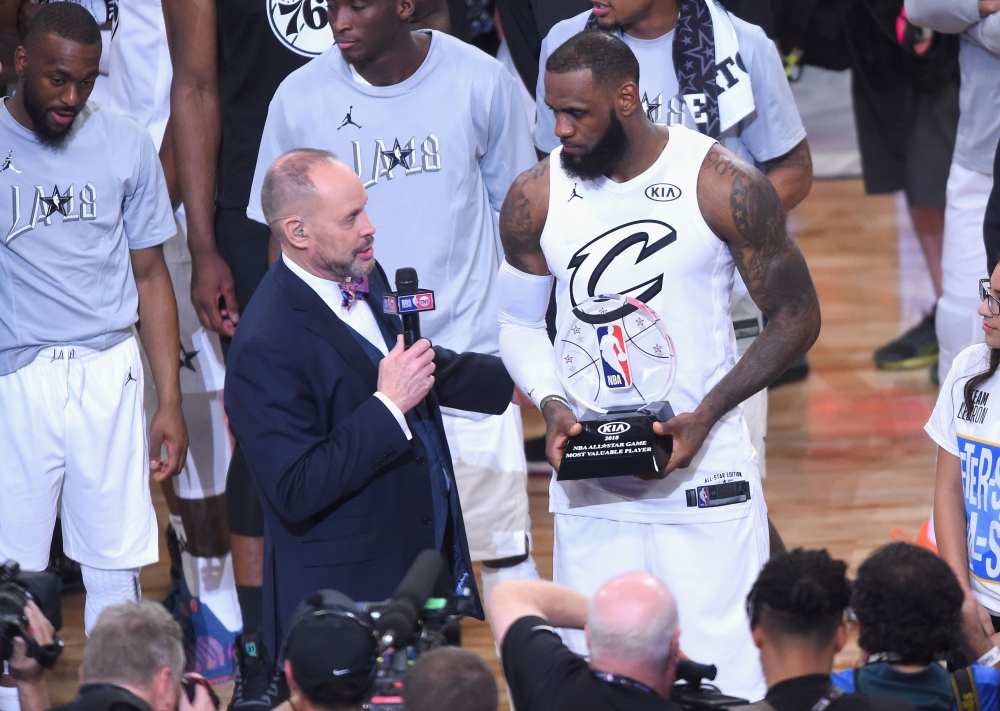 LeBron James No. 23 accepts the MVP award from TNT sportscaster Ernie Johnson Jr. during the NBA All-Star Game 2018 at Staples Center on Sunday in Los Angeles, California. — AFP