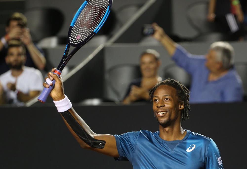Gael Monfils of France celebrates after winning his match against Marin Cilic of Croatia at the Rio Open in Rio de Janeiro, Brazil, Thursday. — Reuters