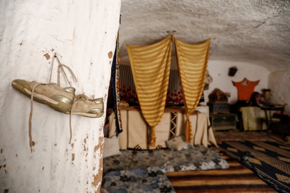 A pair of shoes hang on the wall of a troglodyte house on the outskirts of Matmata, Tunisia. — Reuters photos