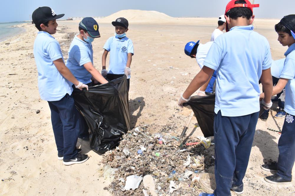 Elementary pupils lend a hand to clean up Salman beach