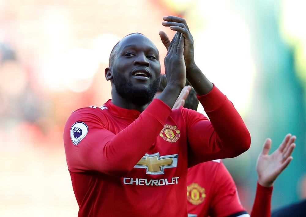 Manchester United's Romelu Lukaku applauds the fans after their Premier League match against Chelsea at Old Trafford, Manchester, Sunday. — Reuters