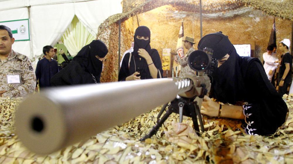 A woman checks a weapon exhibited at an event to celebrate the selection of Abha as the capital of Arab tourism for the year 2017, in this April 20, 2017, file photo. — Reuters