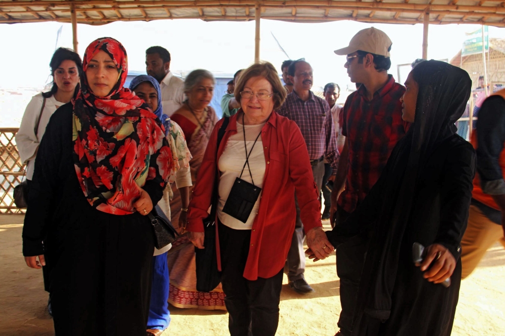 Noble Peace Laureates Mairead Maguire, center, from Northern Ireland and Tawakkol Karman, left, from Yemen walk during their visit to Kutupalong refugee camp in Ukhia, Bangladesh, in this Feb. 25, 2018 file photo. — AFP