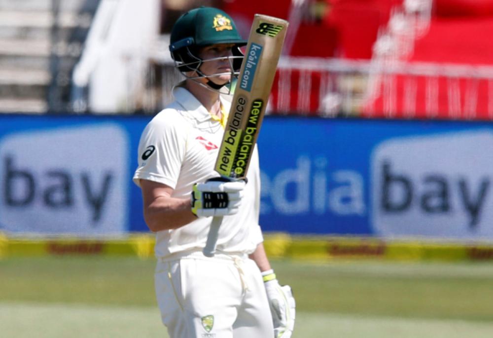 Australia's Steven Smith celebrates scoring a half century against South Africa on the first day of their first cricket Test at Kingsmead Stadium, Durban, Thursday. — Reuters