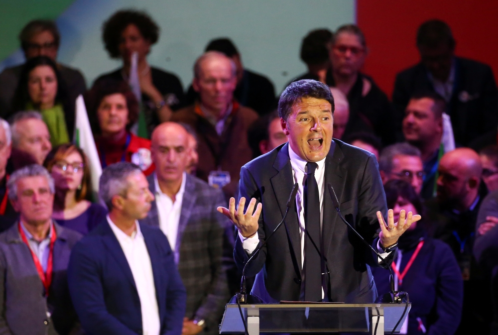 Democratic Party (PD) leader Matteo Renzi speaks during the final rally ahead of the March 4 elections in Florence, Italy, on Friday. — Reuters
