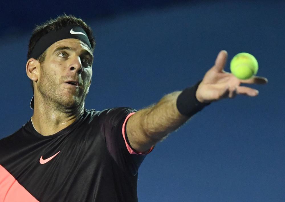Argentina’s Juan Martin del Potro serves to Germany’s Alexander Zverev during their Mexico ATP 500 Open semifinal in Acapulco, Mexico, Friday. — AFP