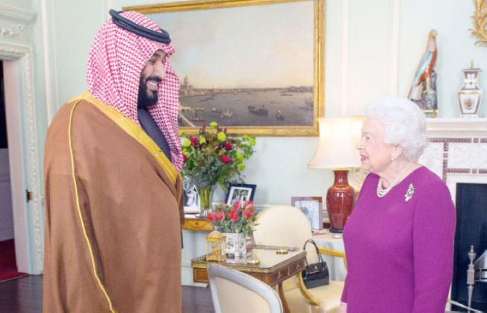 Britain’s Queen Elizabeth II greets Crown Prince Muhammad Bin Salman, deputy premier and minister of defense, at Buckingham Palace in central London on Wednesday. — AFP