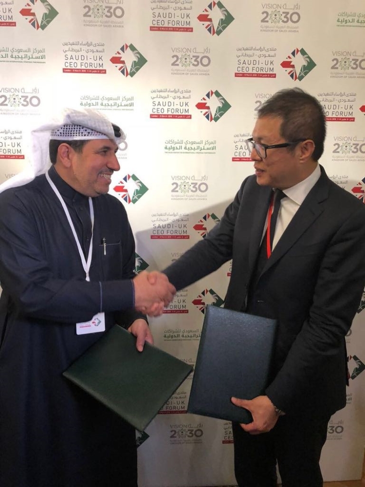 Leon Wang, EVP international & country president China – AstraZeneca, right, shakes hand with Fahad Al Khalaf, CEO – SPIMACO, after agreeing to invest, develop and technology transfer initiative in Saudi Arabia. — Courtesy photo