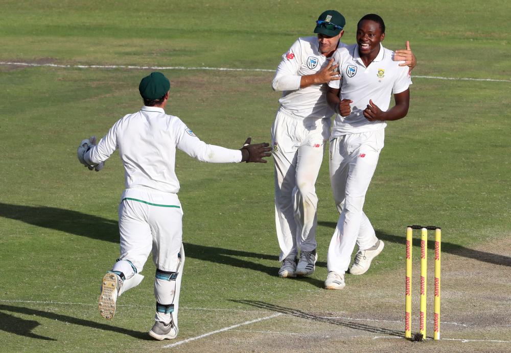 South Africa’s Kagiso Rabada celebrates after taking the wicket of Australia’s Usman Khawaja during their second cricket Test match at St George’s Park, Port Elizabeth, Sunday. — Reuters