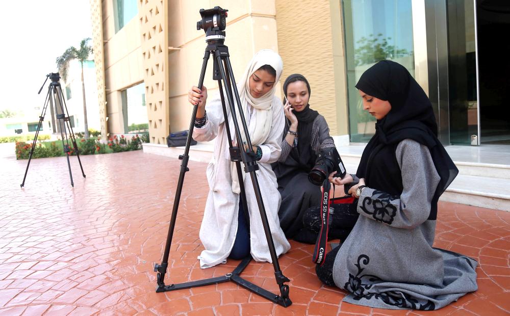 

Saudi women study film making at a university in Jeddah. — Reuters