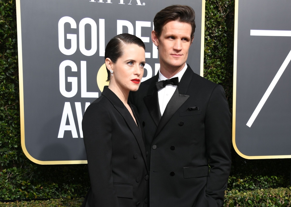 This file photo taken on Jan. 07, 2018 shows actors Claire Foy and Matt Smith arriving for the 75th Golden Globe Awards in Beverly Hills, California. - AFP