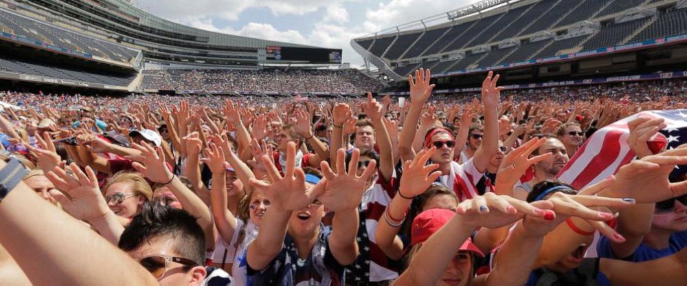 In this file photo, fans cheer for the United States against Belgium during a Brazil 2014 World Cup viewing party at Soldier Field in Chicago. Chicago, the home of the US Soccer Federation, has dropped out of the North American bid for the 2026 World Cup. — AP