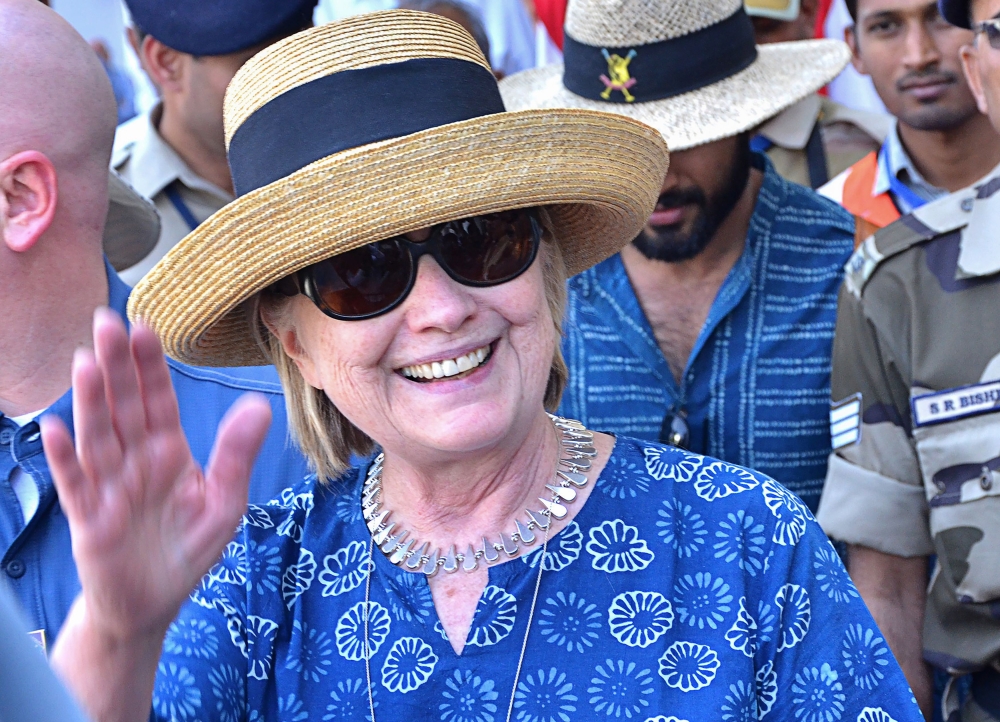 Former US secretary of state Hillary Clinton waves as she arrives in Jodhpur in the western Indian state of Rajasthan in this March 13, 2017 file photo. — AFP