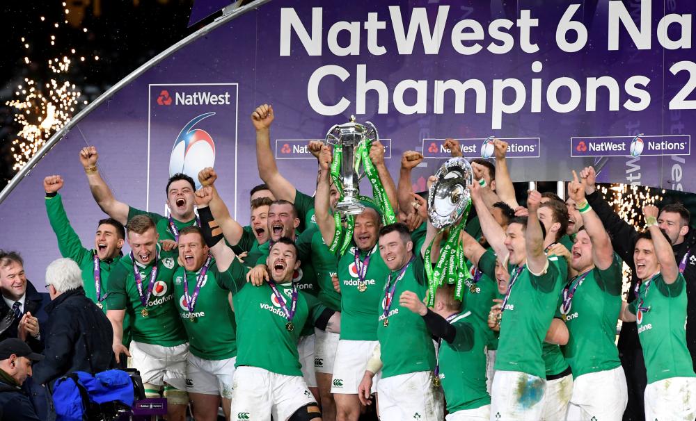Ireland’s Rory Best and teammates celebrate with the Six Nations trophy at Twickenham Stadium, London, Saturday. — Reuters