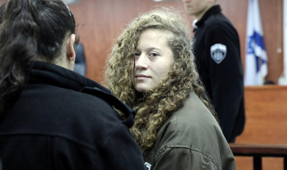 A Palestinian teen arrested in December for slapping two Israeli soldiers who entered the yard of her West Bank home has become a vivid symbol of the Israeli-Palestinian conflict. Ahed Tamimi, who was 16 at the time, is being held in an Israeli prison until the end of proceedings against her. — File photo