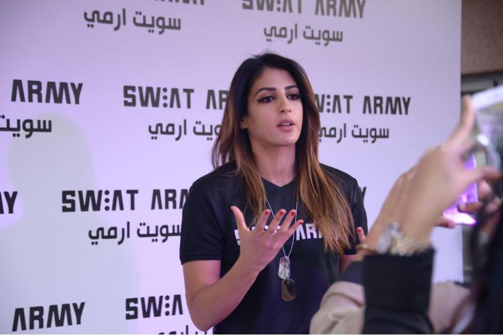 Rawan Zahran speaks at the recent launch of the Sweat Army Movement in Jeddah.
