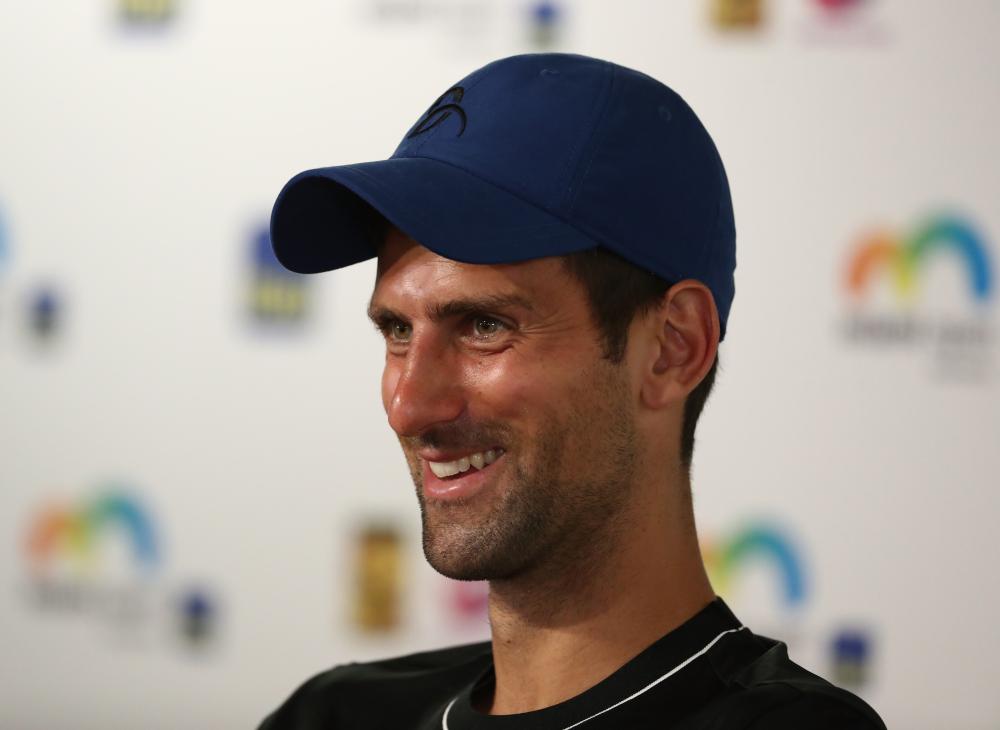 Novak Djokovic of Serbia speaks to the press during second day of the Miami Open at the Crandon Park Tennis Center in Key Biscayne, Florida, Tuesday. — AFP