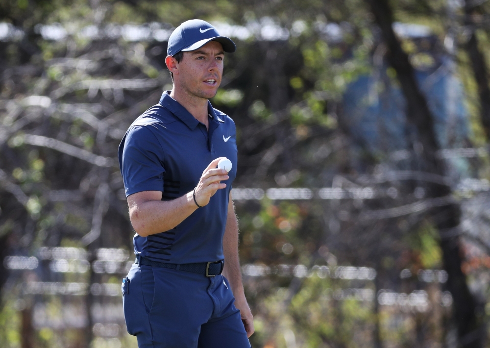 Rory McIlroy of Northern Ireland reacts during the first round of the World Golf Championships-Dell Match Play at Austin Country Club on Wednesday in Austin, Texas. — AFP