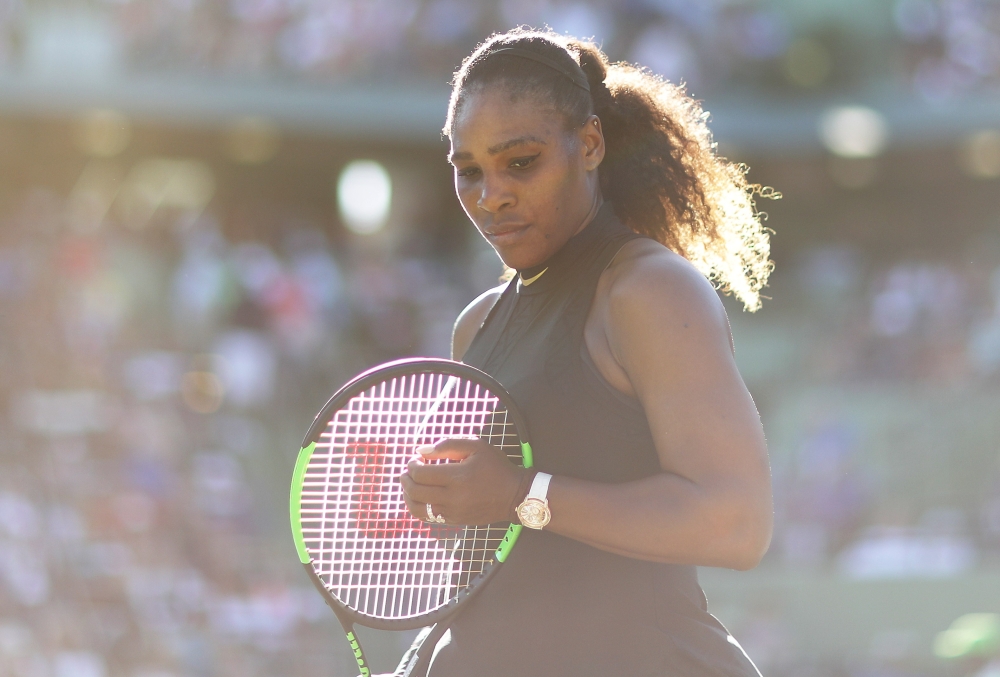 Serena Williams looks on between games against Naomi Osaka of Japan during Day 3 of the Miami Open at the Crandon Park Tennis Center on Wednesday in Key Biscayne, Florida. — AFP