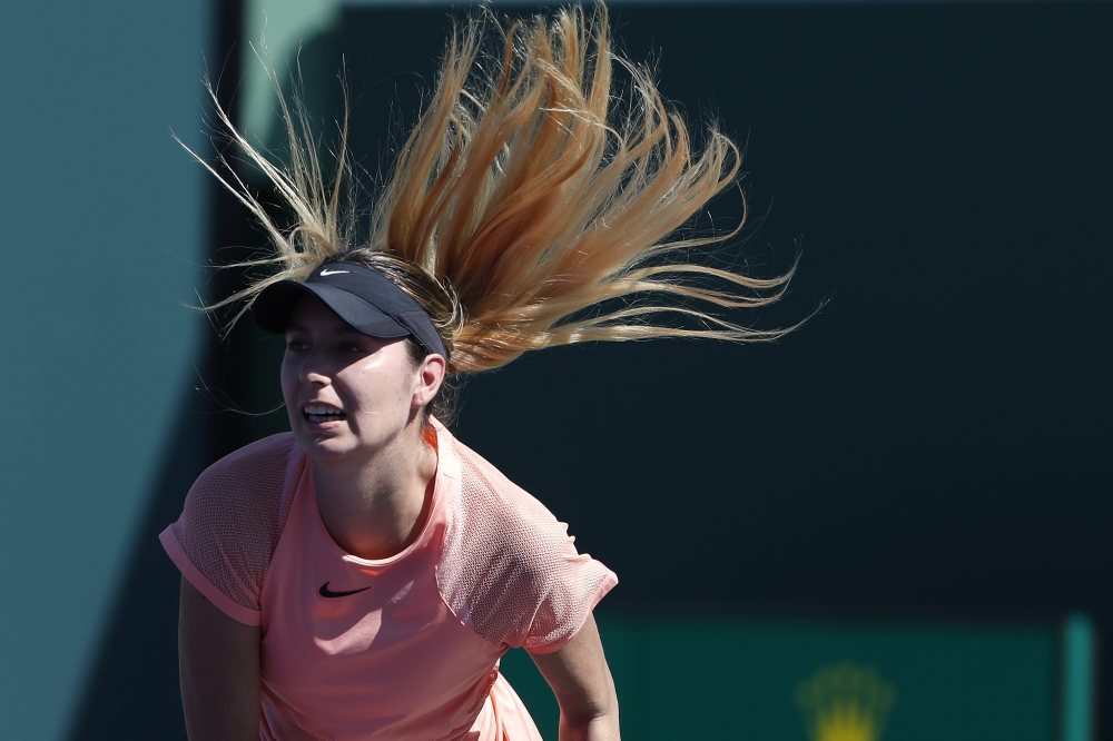 Oceane Dodin of France serves against Simona Halep of Romania (not pictured) on day three of the Miami Open at Tennis Center at Crandon Park. Halep won 3-6, 6-3, 7-5. — Reuters