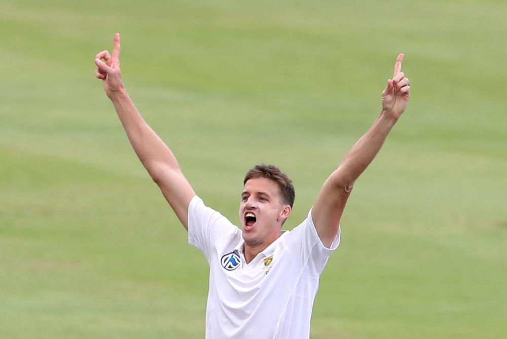 South Africa's Morne Morkel celebrates taking an Australian wicket during the third cricket Test match at Newlands, Cape Town, Sunday. — Reuters