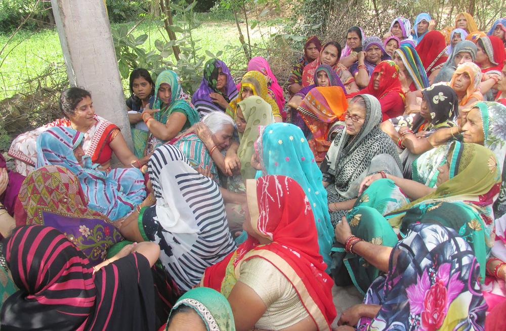 Relatives of Indian journalist Sandeep Sharma grieve following his death after being mowed down by a truck in Bhind in Madhya Pradesh state on Monday. — AFP