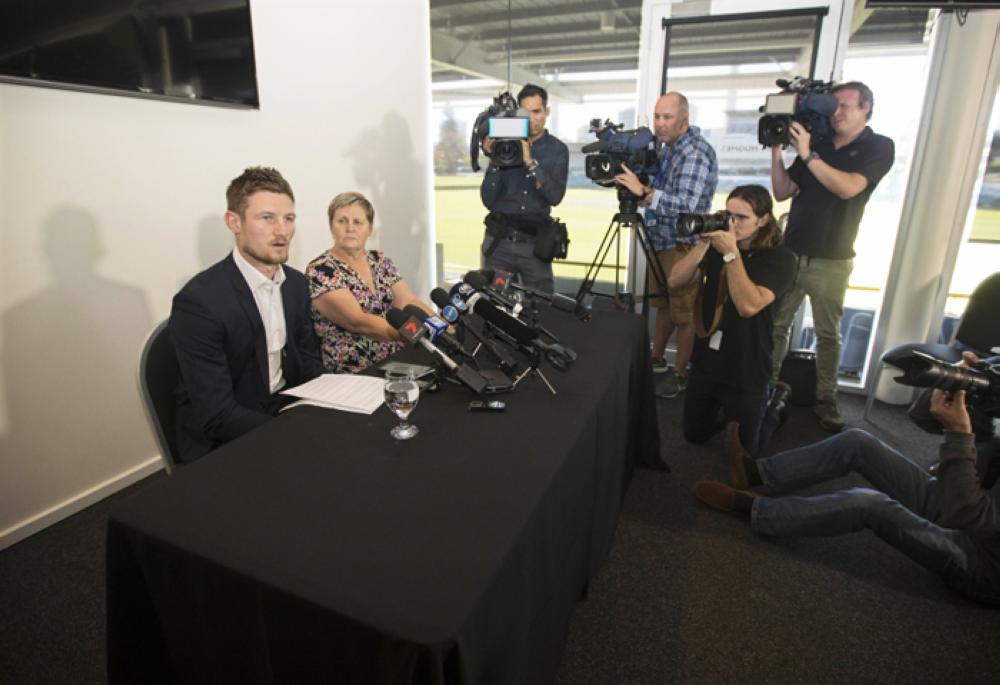 Australian opening batsman Cameron Bancroft (L) and Western Australian Cricket Association CEO Christina Matthews (2-L) attend a press conference at WACA ground in Perth, Australia, Thursday. — EPA