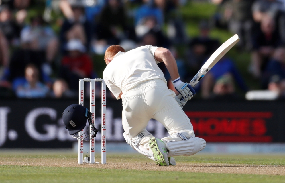 England's Jonny Bairstow is struck on the helmet by a ball from New Zealand's Colin de Grandhomme during the second Test at Hagley Oval, Christchurch, New Zealand, on Friday. — Reuters