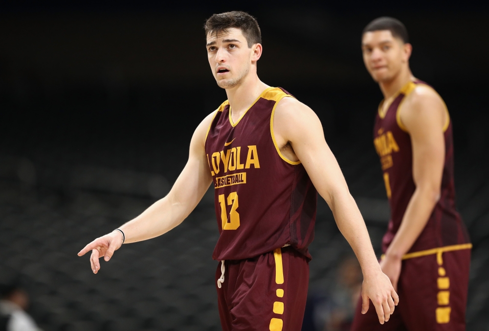 Clayton Custer No. 13 of the Loyola Ramblers looks on during practice before the 2018 Men's NCAA Final Four at the Alamodome on Friday in San Antonio, Texas. — AFP