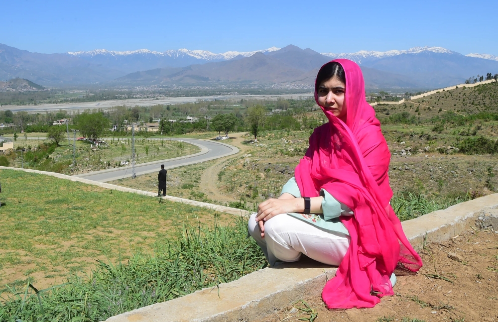 Pakistani activist and Nobel Peace Prize laureate Malala Yousafzai poses for a photograph at all-boys Swat Cadet College Guli Bagh, during her hometown visit, some 15 km outside of Mingora, Pakistan, on Saturday. — AFP