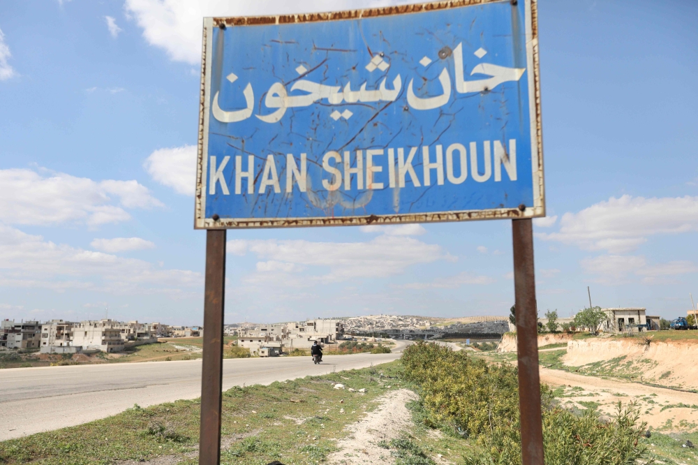 This picture taken on March 31, 2018, shows roadsigns in Khan Shaykhun, on the Damascus-Aleppo highway, where a chemical attack happened on April 4, 2017. — FP