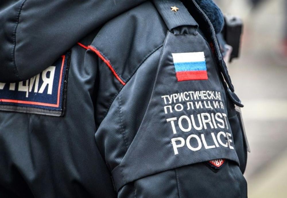 A tourist policewoman seen on patrol in downtown Moscow. With two months to go to the World Cup, the Russian government is thinking of creating units in other cities. — AFP