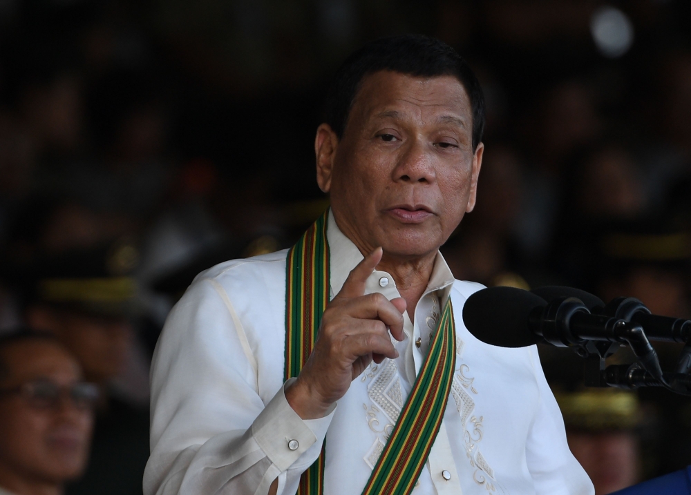Philippine President Rodrigo Duterte delivers his speech during the 121st founding anniversary of Philippine army at the army headquarters in Manila in this March 20, 2018 file photo. — AFP