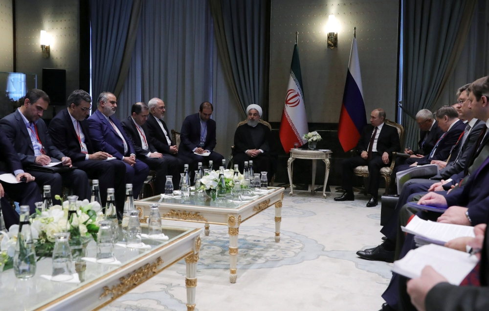Russian President Vladimir Putin meets with his Iranian counterpart Hassan Rohani in Ankara, Wednesday. — Reuters