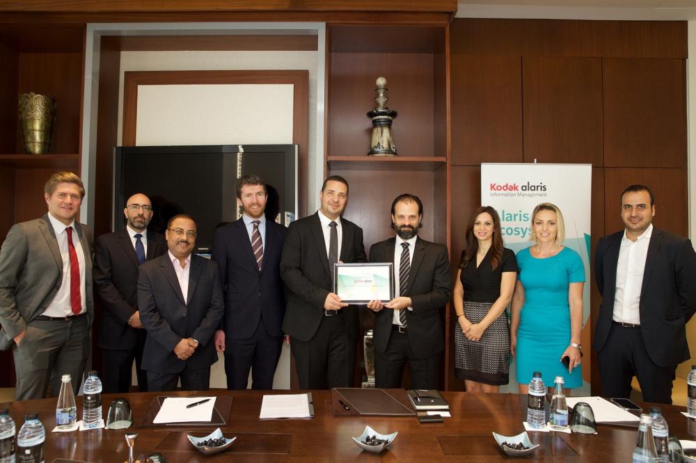 From left:  Gerry Kelliher, Sales Director EMEA at Kodak Alaris; Nicholas Argyrides, Chief of Sales and Marketing & Deputy GM at Mindware; and Naji Kazak, Regional General Manager for Kodak Alaris IM 

