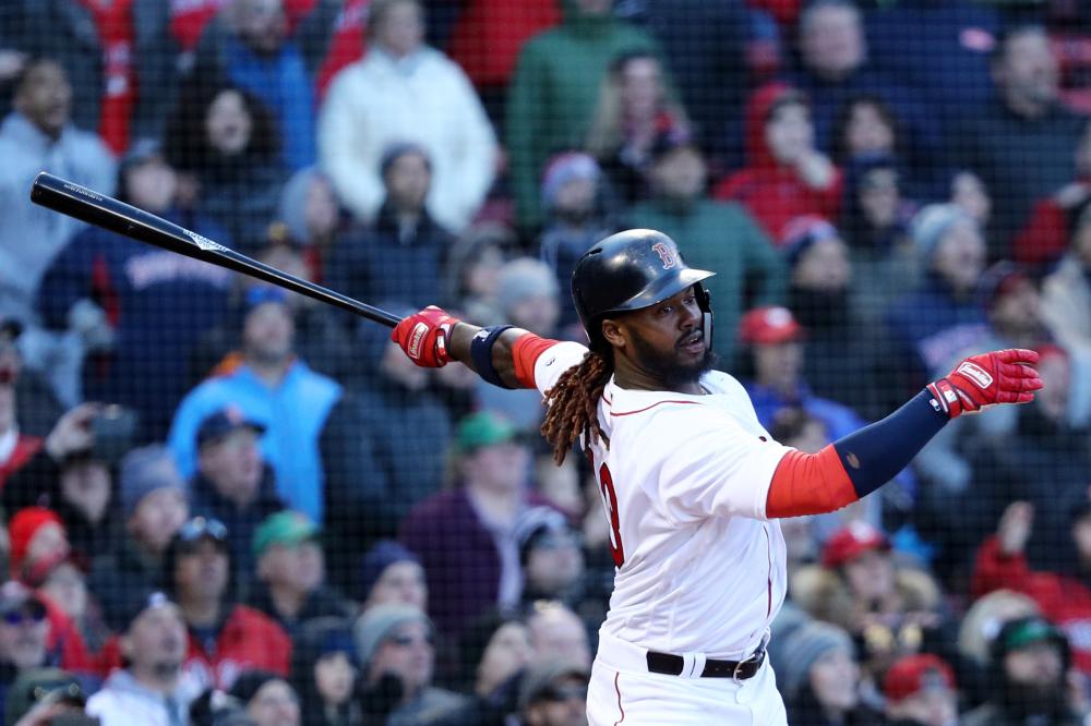 Hanley Ramirez of the Boston Red Sox celebrates after hitting a walk off single during the 12th inning against the Tampa Bay Rays during their MLB game at Fenway Park in Boston Thursday. — AFP
