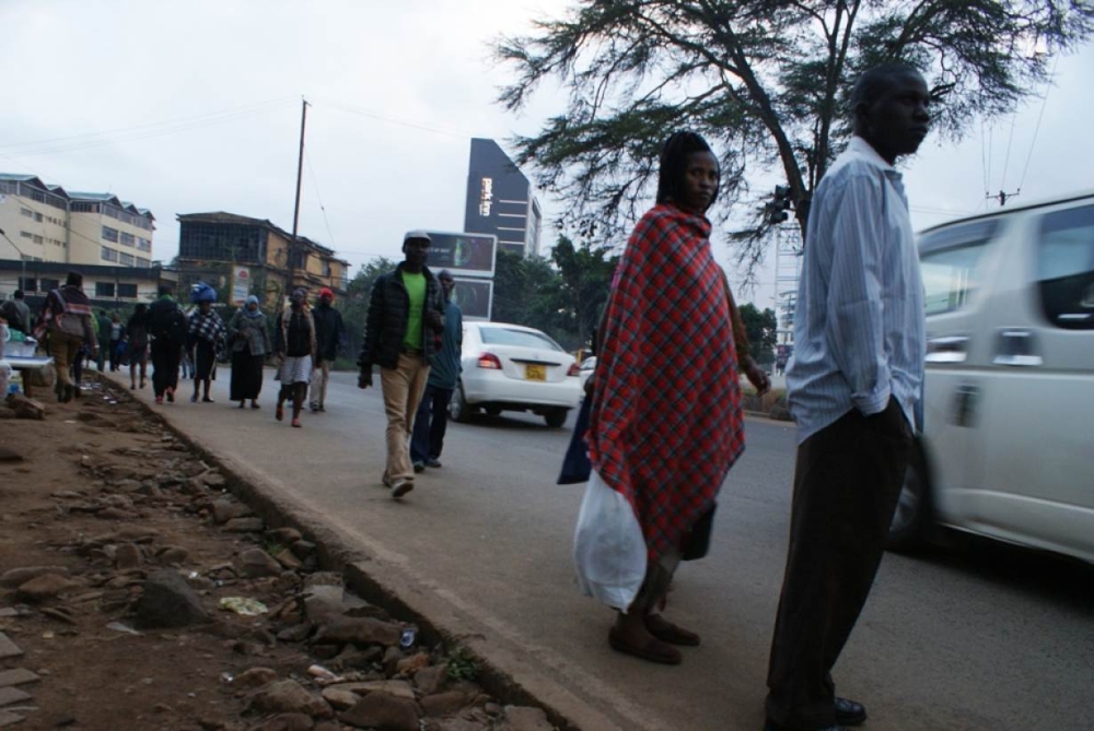 Pedestrians wait to cross Waiyaki Way on the northwest side of Nairobi. — Thomson Reuters Foundation photos