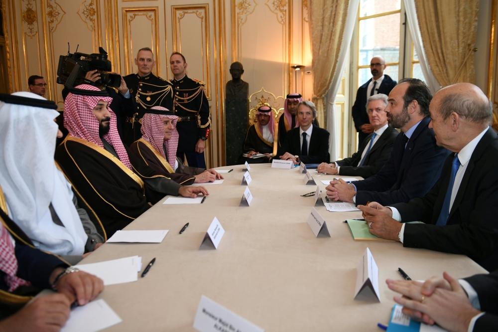 French Prime Minister Edouard Philippe (2ndR), flanked by French Minister of Europe and Foreign Affairs Jean-Yves Le Drian, attends a meeting with Crown Prince Muhammad Bin Salman, deputy premier and minister of defense, and his accompanying delegation in Paris on Monday. — Reuters