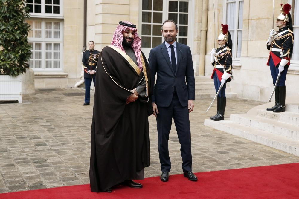 French Prime Minister Edouard Philippe (2ndR), flanked by French Minister of Europe and Foreign Affairs Jean-Yves Le Drian, attends a meeting with Crown Prince Muhammad Bin Salman, deputy premier and minister of defense, and his accompanying delegation in Paris on Monday. — Reuters
