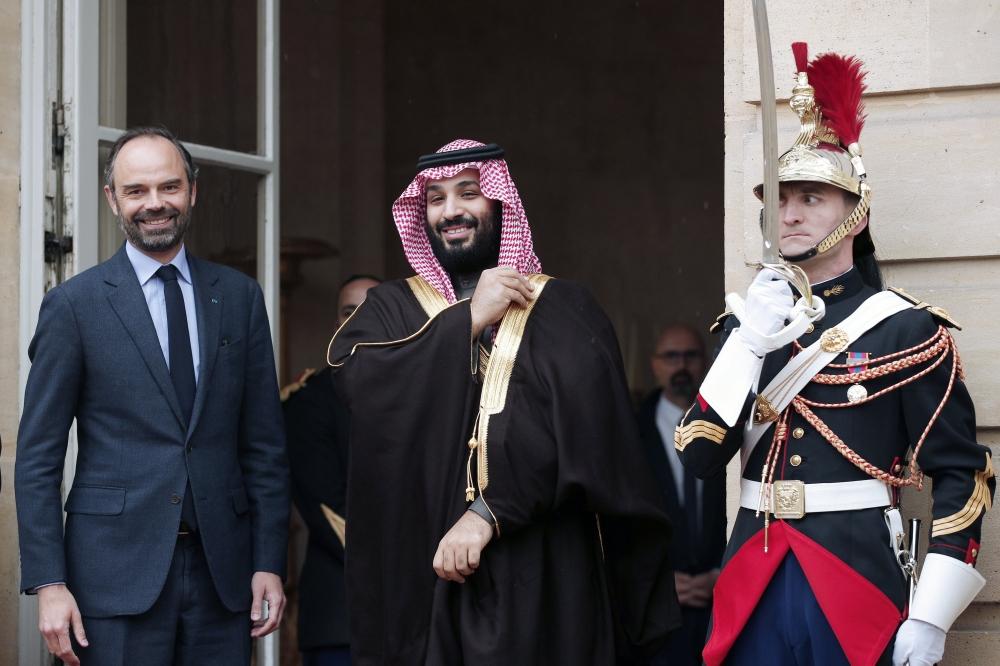 French Prime Minister Edouard Philippe (2ndR), flanked by French Minister of Europe and Foreign Affairs Jean-Yves Le Drian, attends a meeting with Crown Prince Muhammad Bin Salman, deputy premier and minister of defense, and his accompanying delegation in Paris on Monday. — Reuters