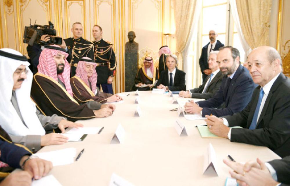 French Prime Minister Edouard Philippe (2ndR), flanked by French Minister of Europe and Foreign Affairs Jean-Yves Le Drian, attends a meeting with Crown Prince Muhammad Bin Salman, deputy premier and minister of defense, and his accompanying delegation in Paris on Monday. — Reuters