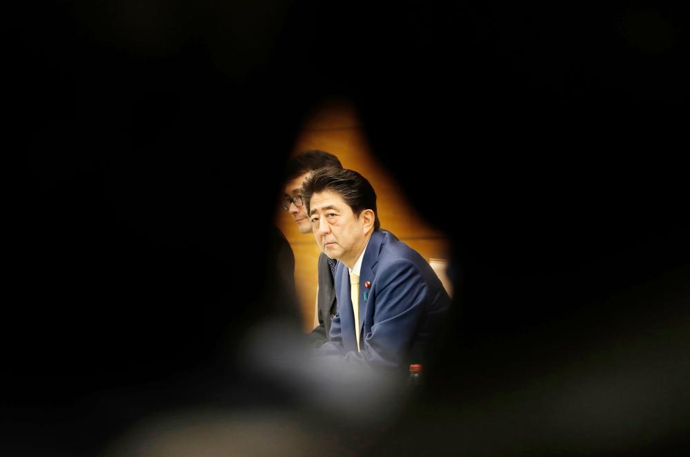 Japan’s Prime Minister Shinzo Abe is seen at his official residence in Tokyo in this April 5, 2018 file photo. — AFP