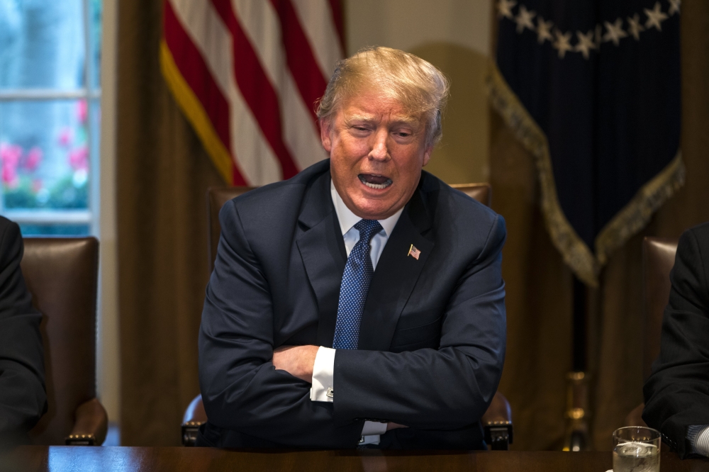 US President Donald Trump speaks with the media before a meeting with his military leadership in the Cabinet Room of the White House in Washington on Monday. — EPA