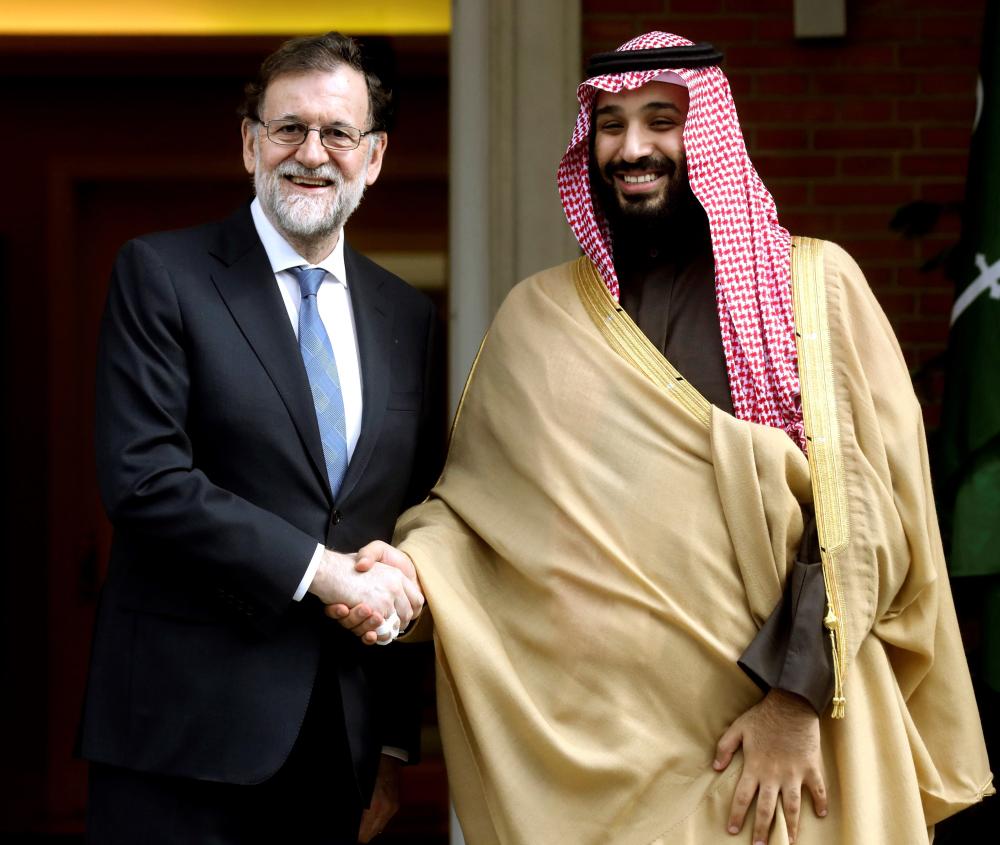 Crown Prince Muhammed Bin Salman, deputy premier and minister of defense, is welcomed by Spanish Prime Minister Mariano Rajoy for an official meeting at the Moncloa Palace in Madrid, Thursday. — EPA